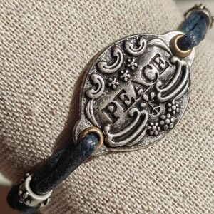 New Lucky Brand Bracelet Peace Symbol Medallion Charm Cord Navy Blue Silver Gold